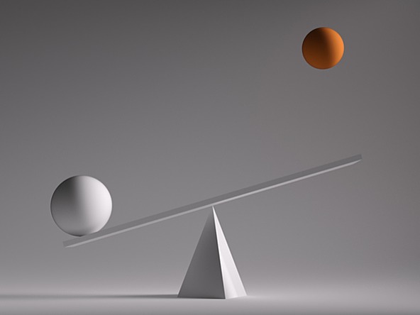 scales graphic with a balancing ball and another suspended above